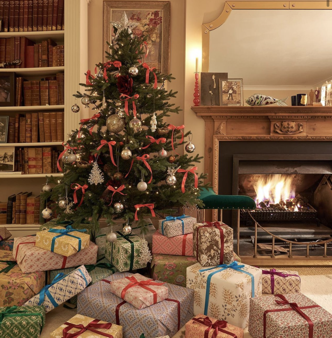 Christmas Tree surrounded by presents and a fireplace, Sarah Vanrenen