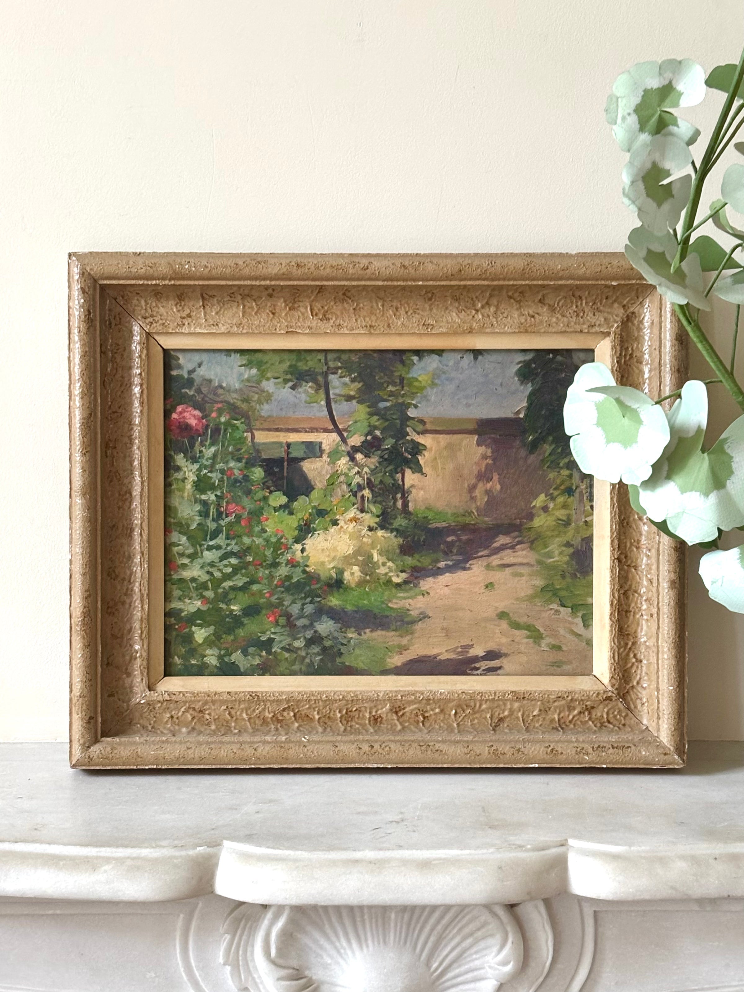 French oil painting of a garden in the sunshine with a path running up to a house