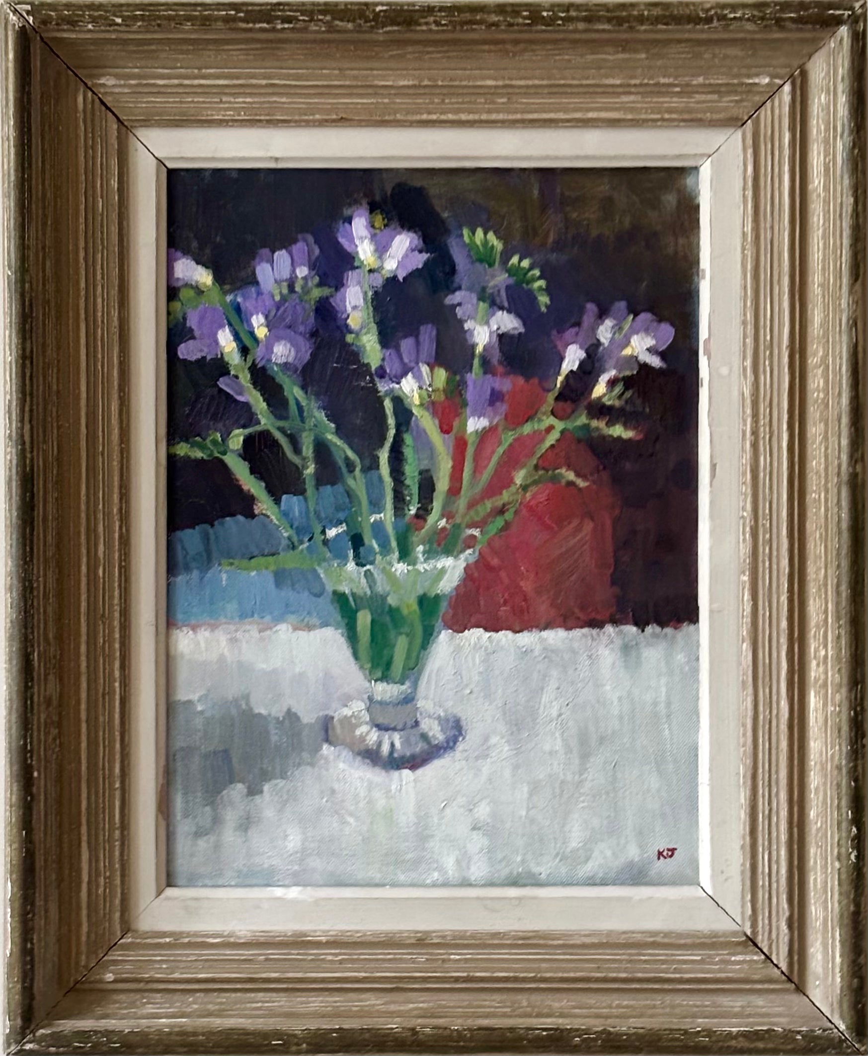 Purple Flowers in Glass Vase