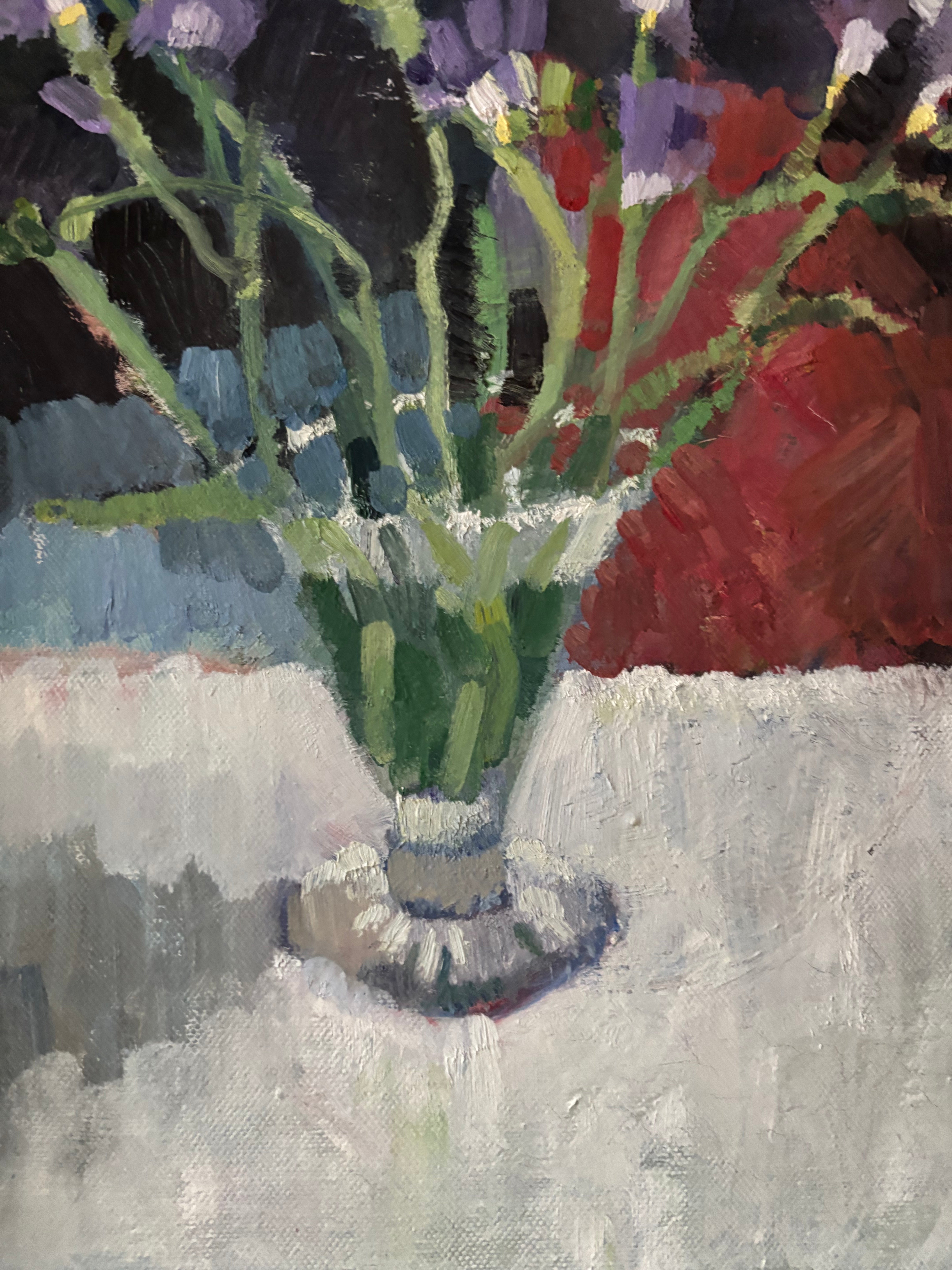 Purple Flowers in Glass Vase
