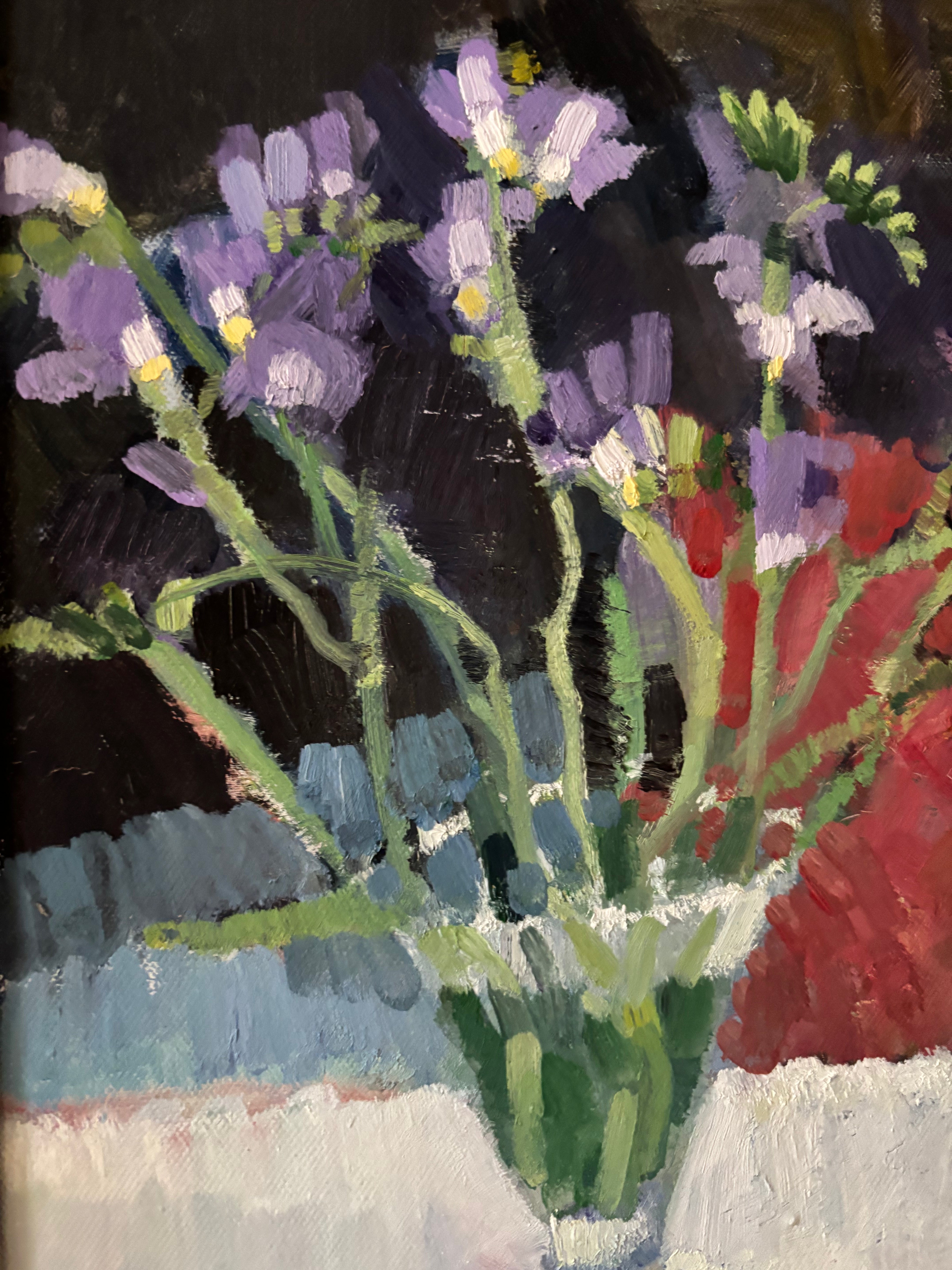 Purple Flowers in Glass Vase