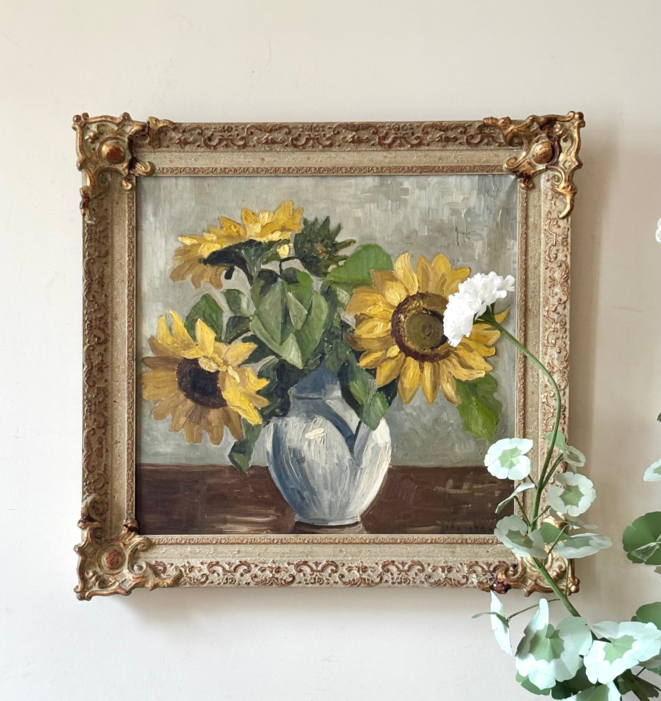 Sunflowers in a White Vase
