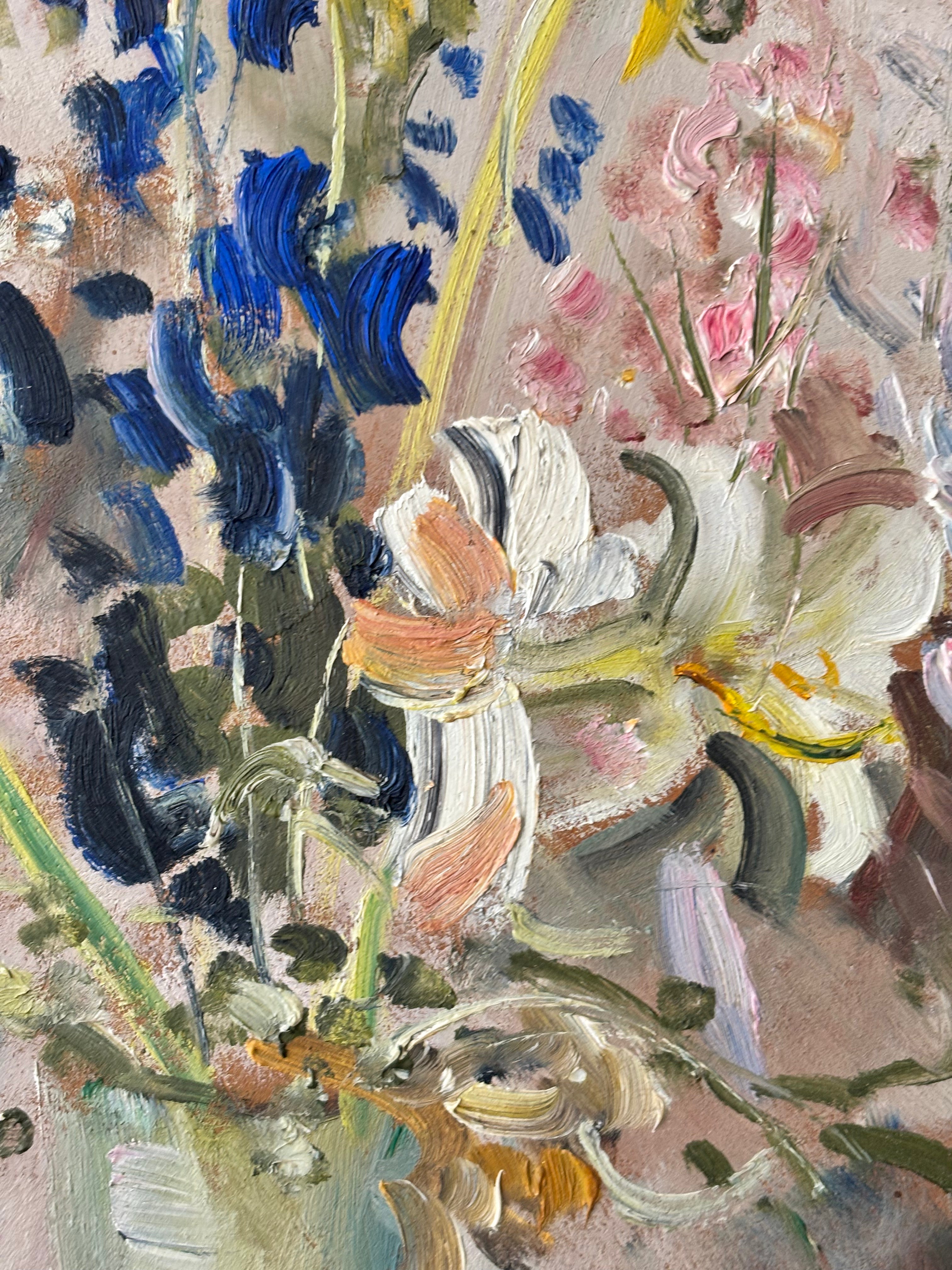 Spring Flowers in a Tall Glass Vase