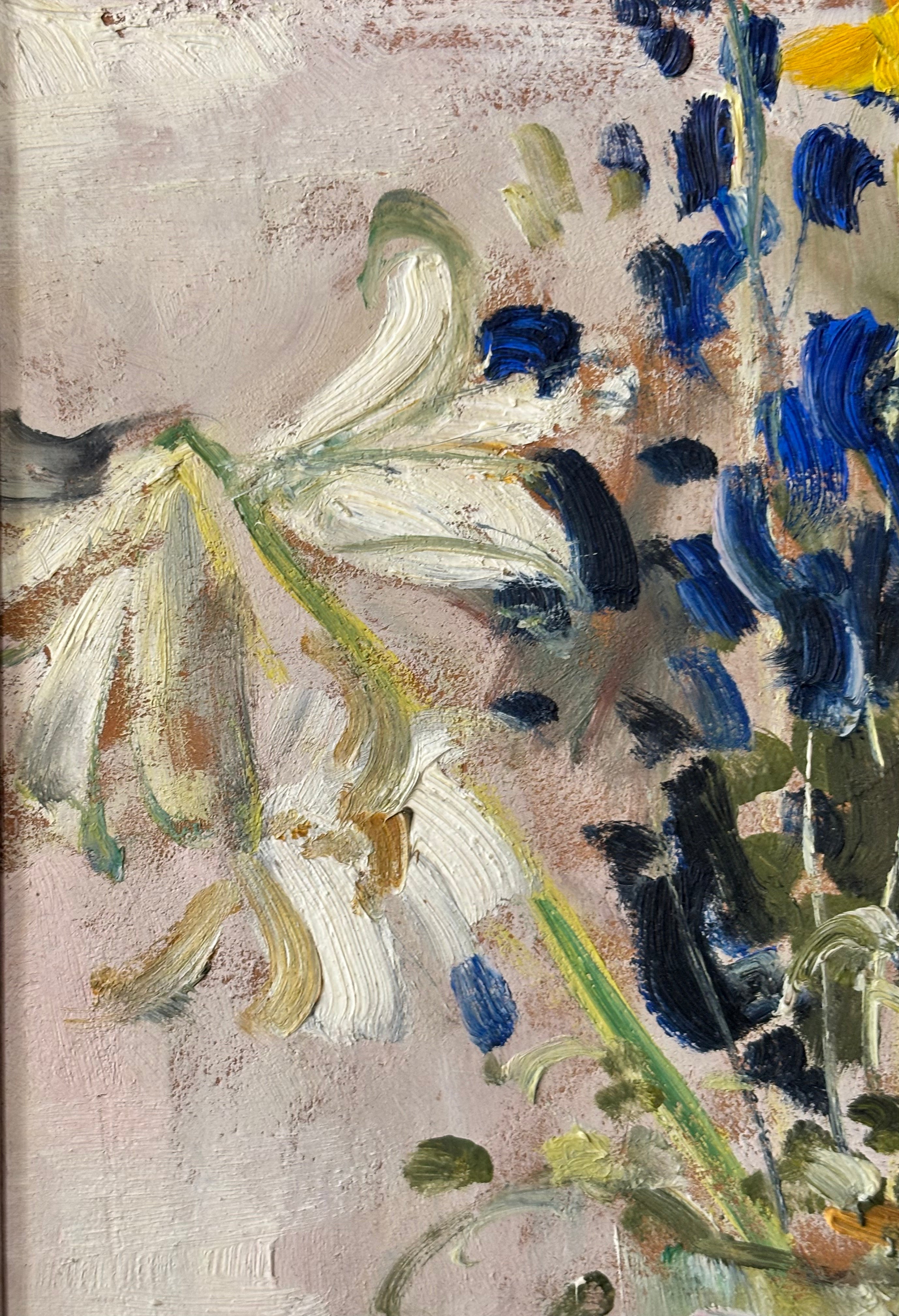 Spring Flowers in a Tall Glass Vase