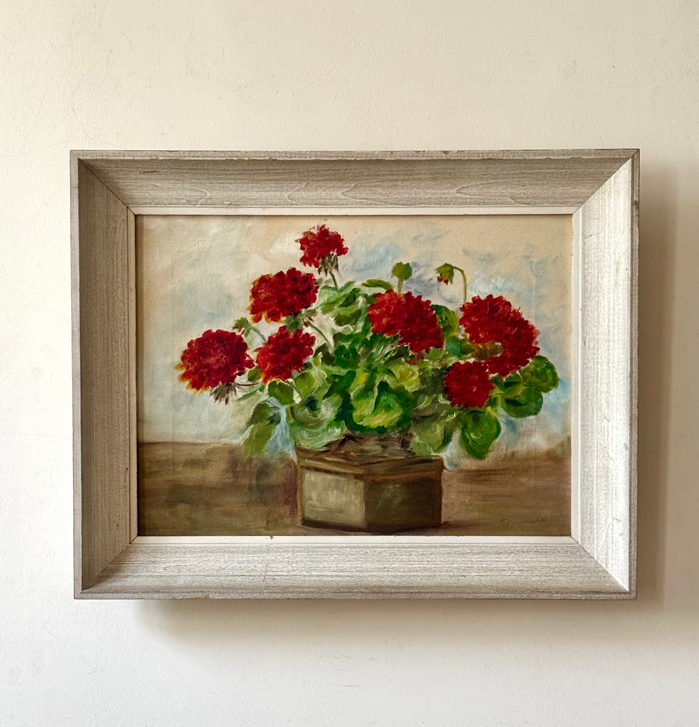 Red Geraniums in a Brown Vase
