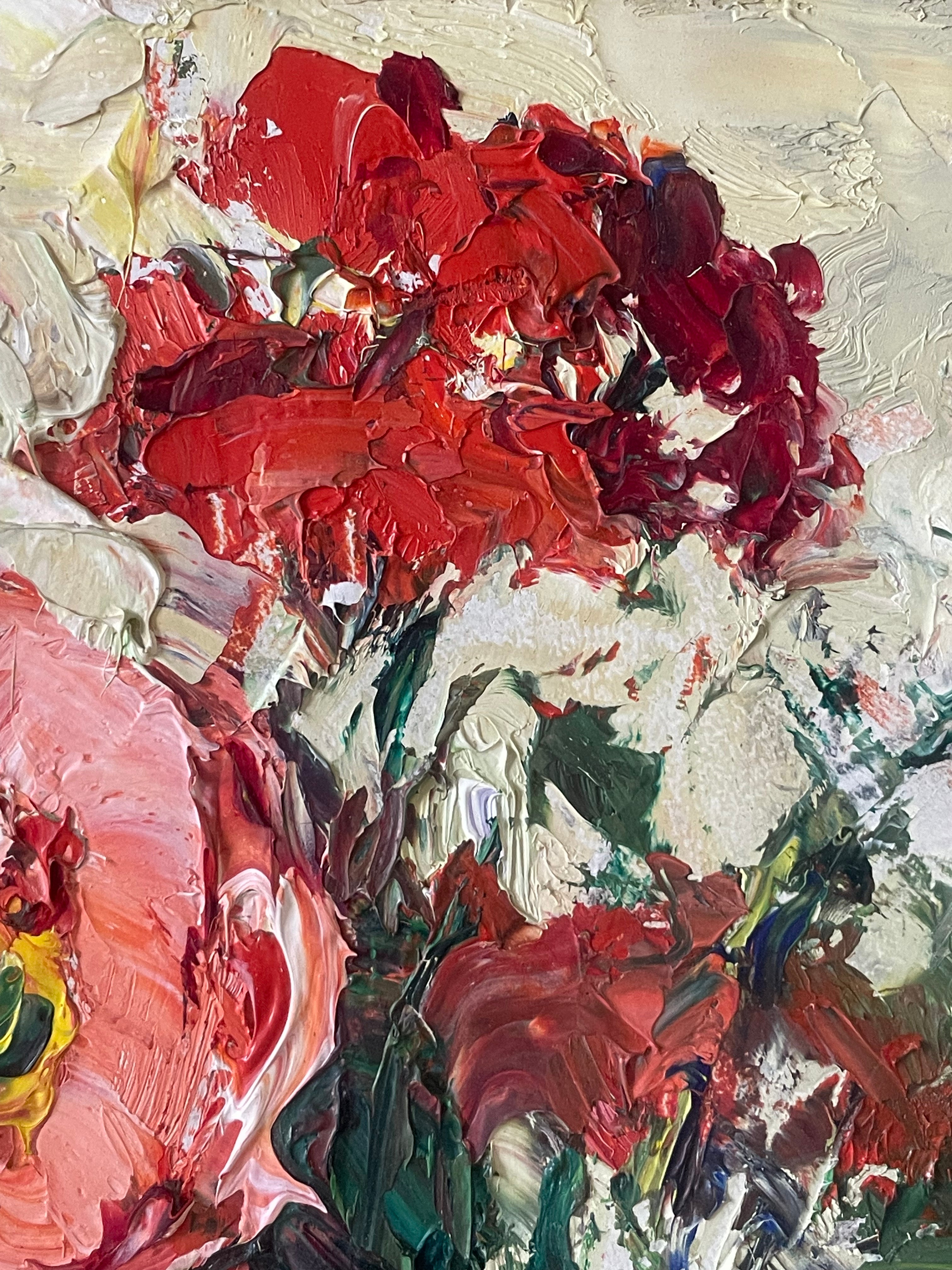 Red Flowers in a White Jug