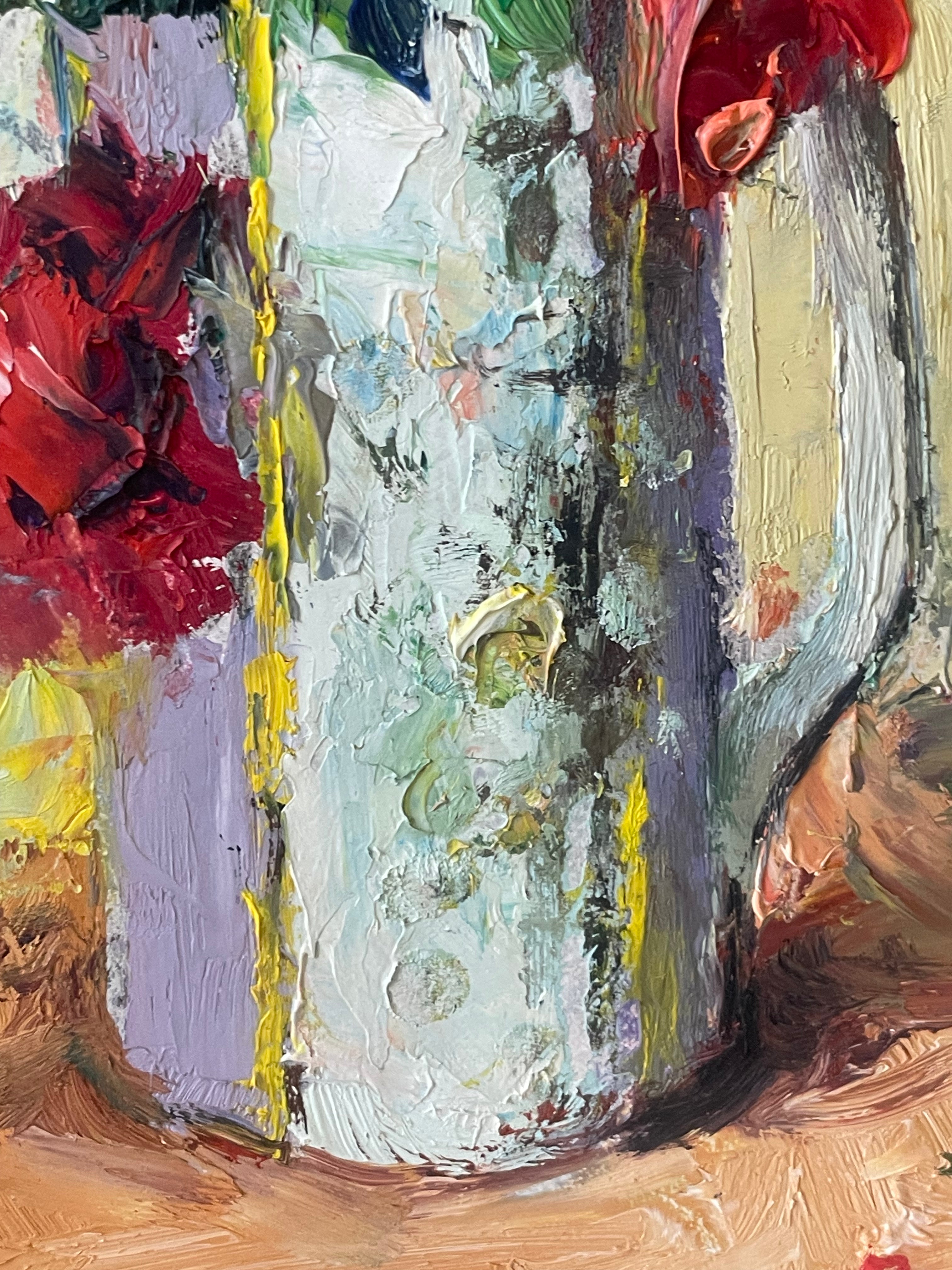 Red Flowers in a White Jug