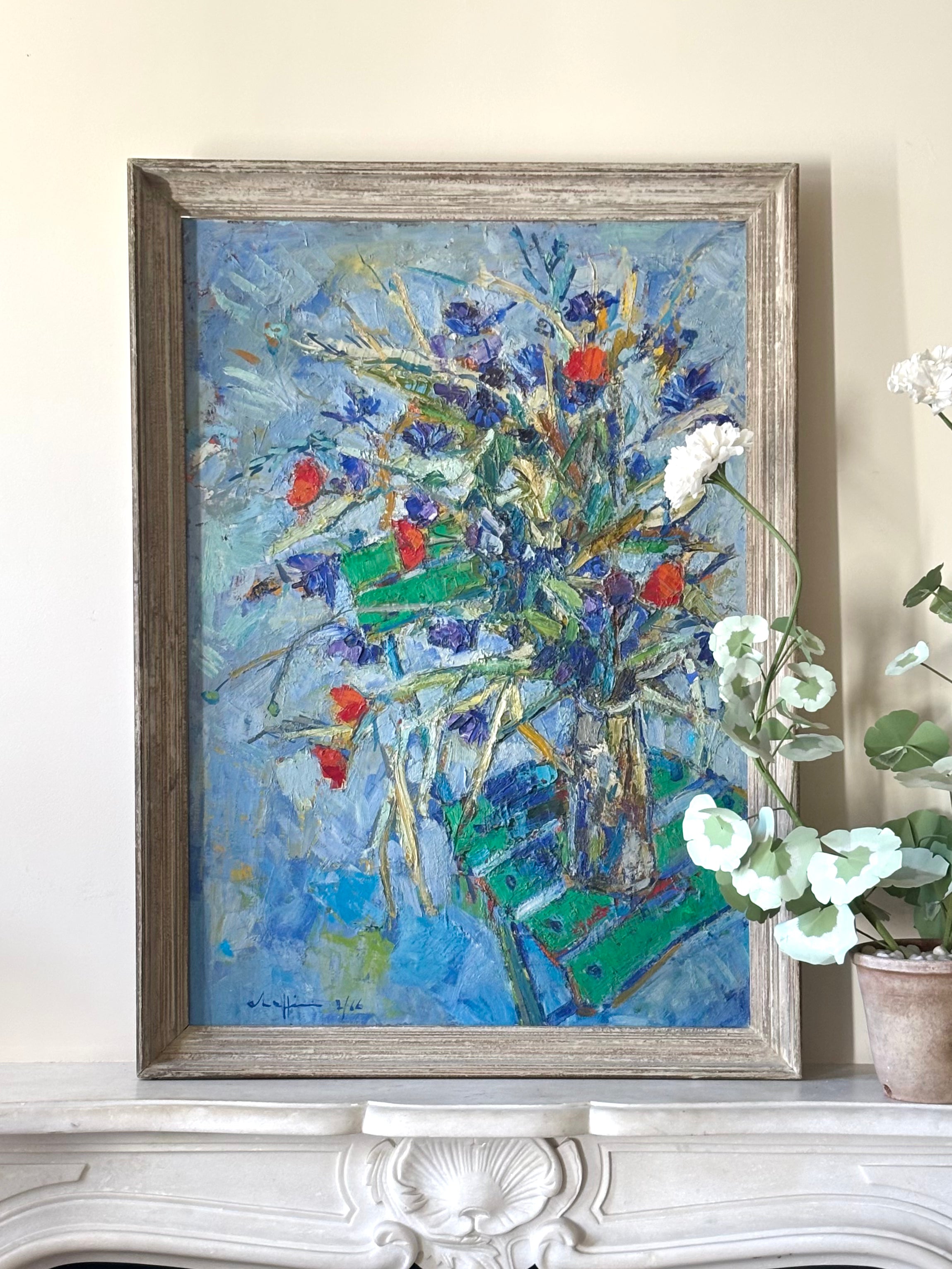 Flowers on a Green Chair