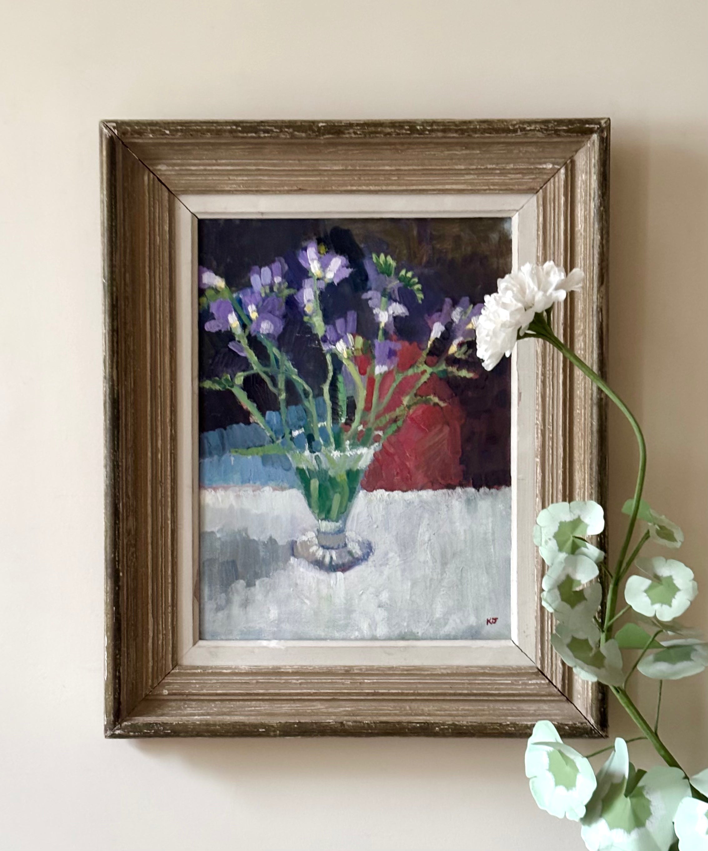 Purple Flowers in Glass Vase