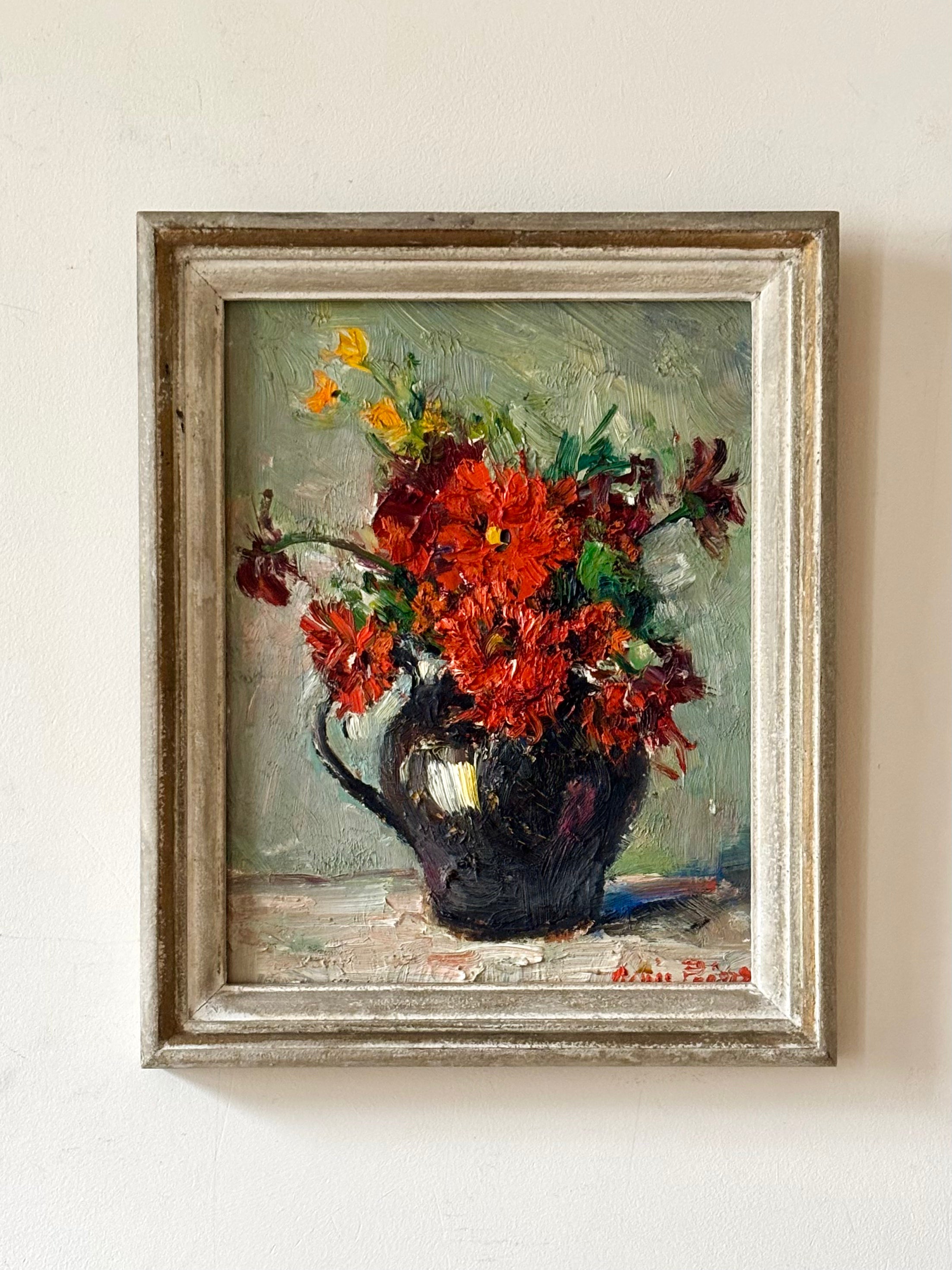 Red Flowers in Black Jug