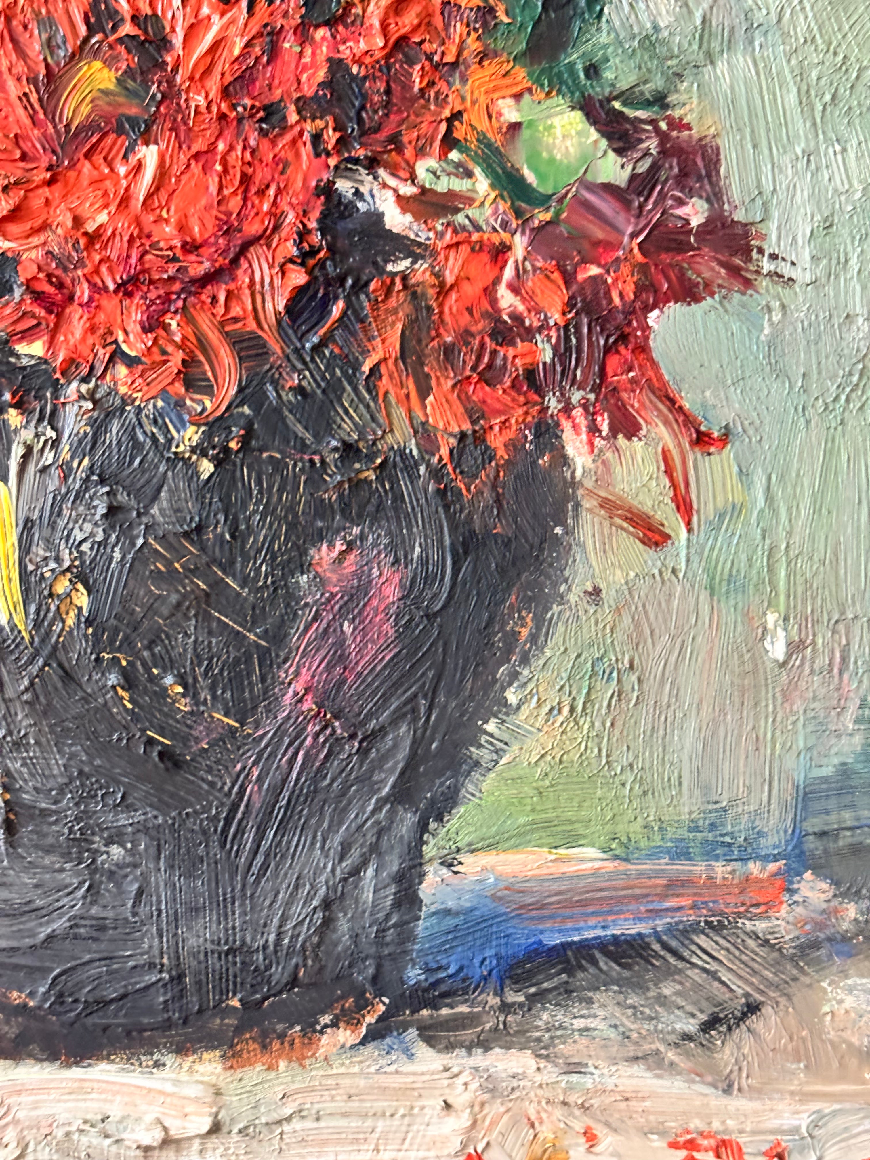 Red Flowers in Black Jug