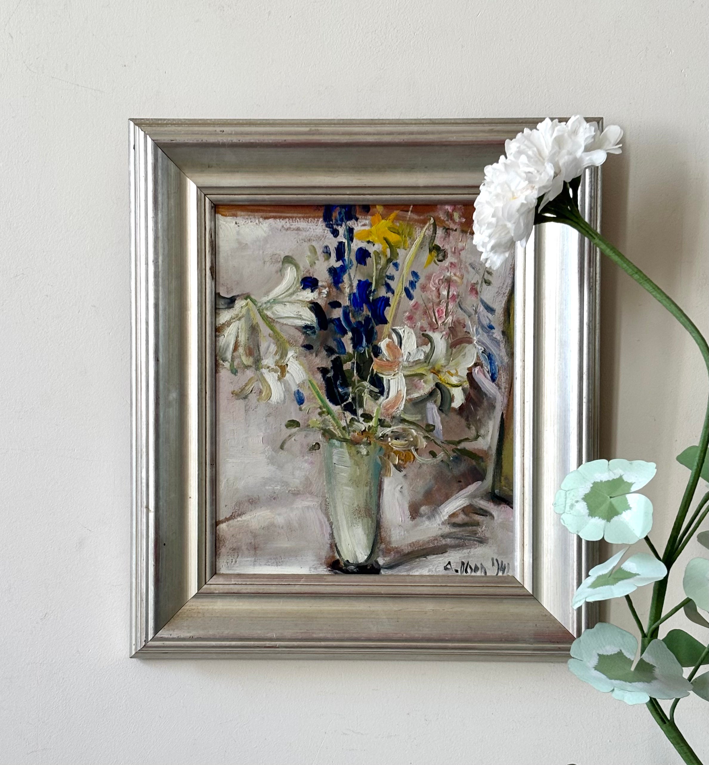 Spring Flowers in a Tall Glass Vase