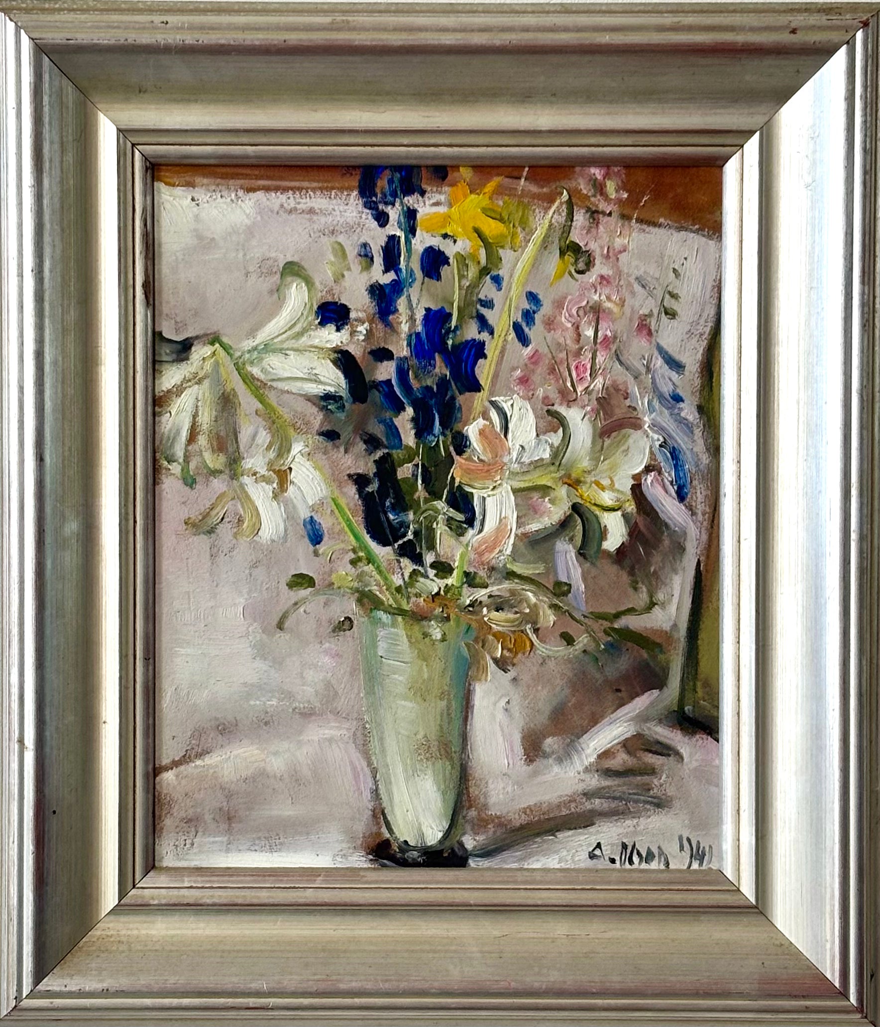 Spring Flowers in a Tall Glass Vase