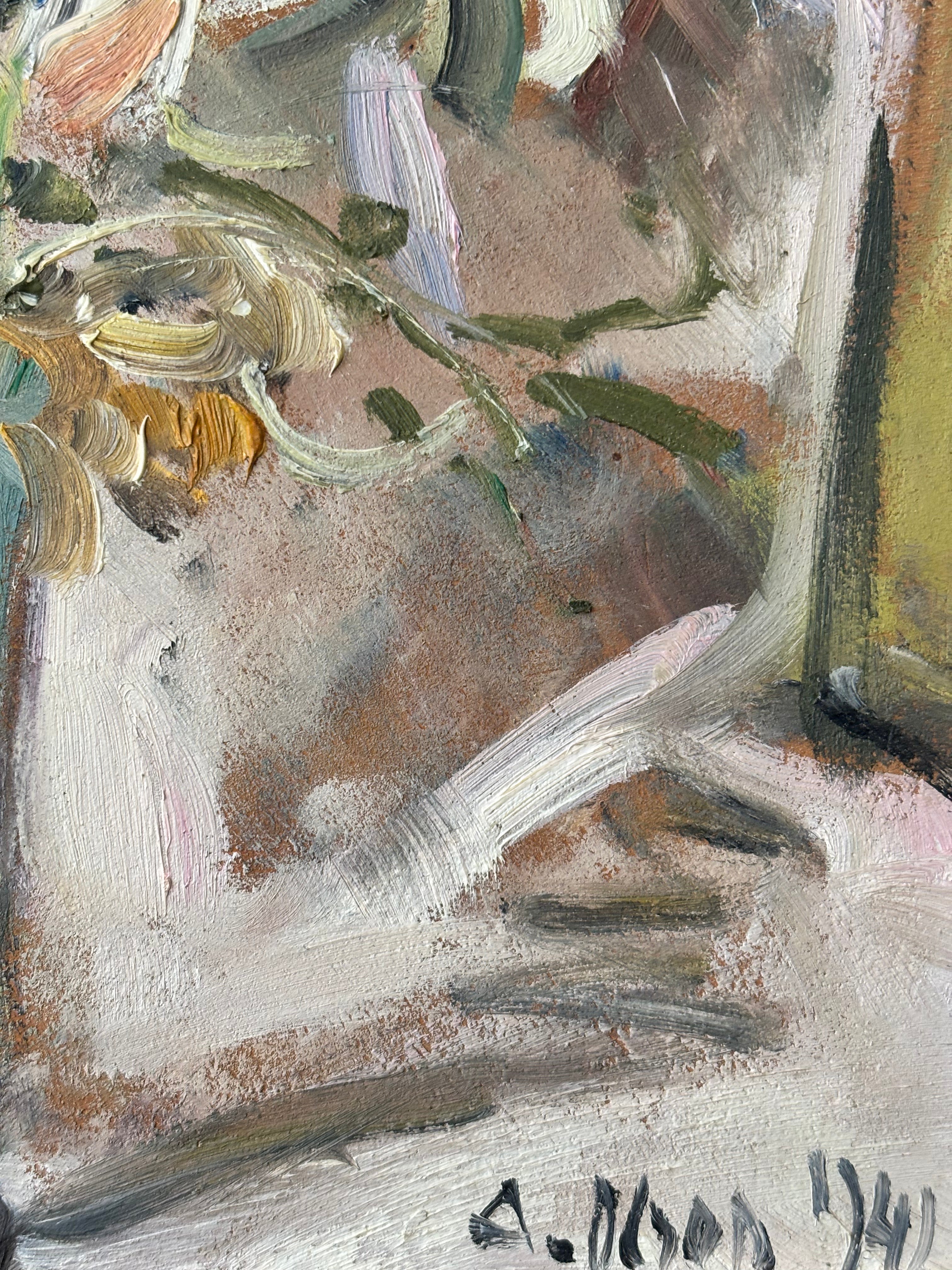 Spring Flowers in a Tall Glass Vase