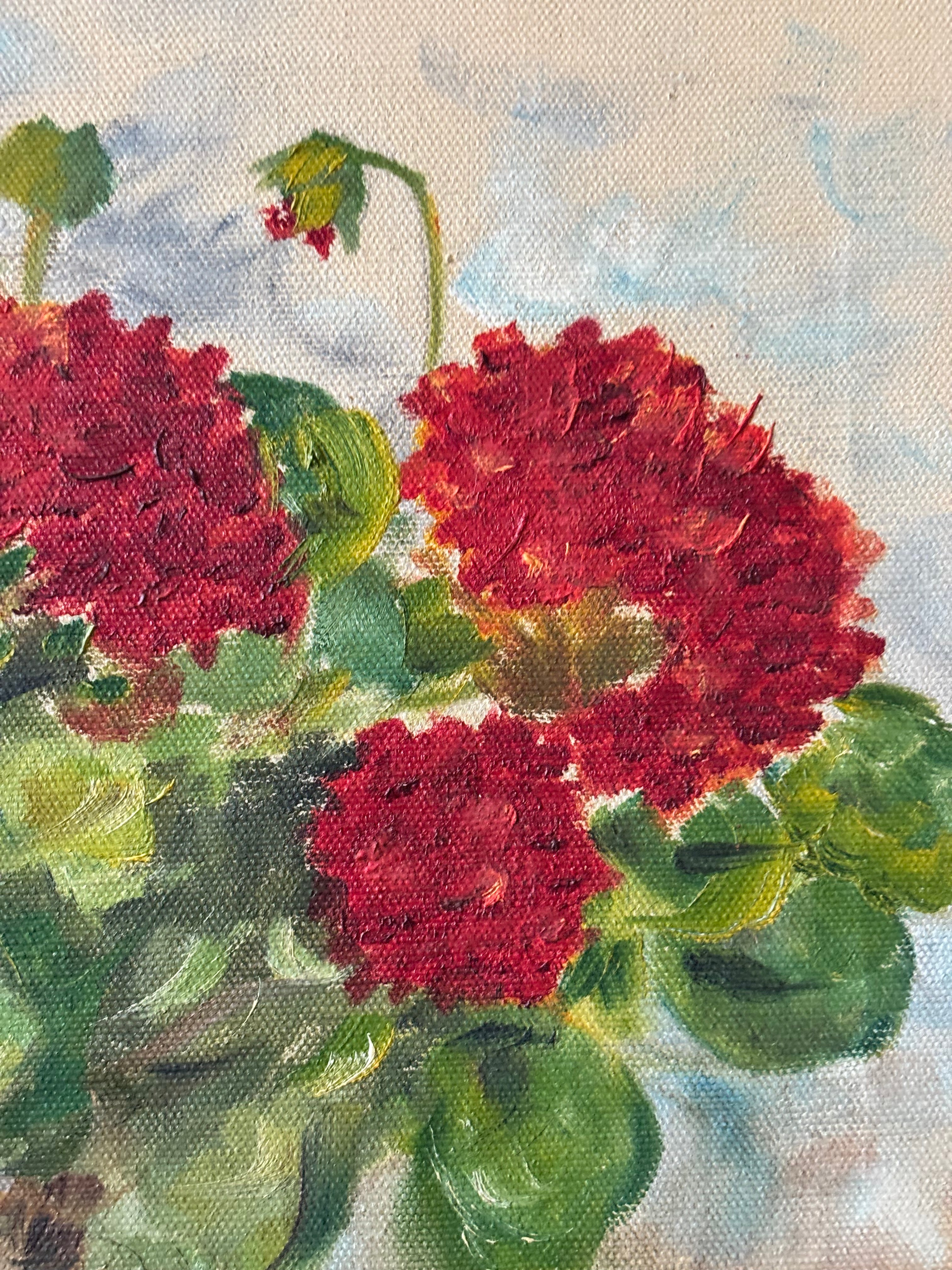 Red Geraniums in a Brown Vase